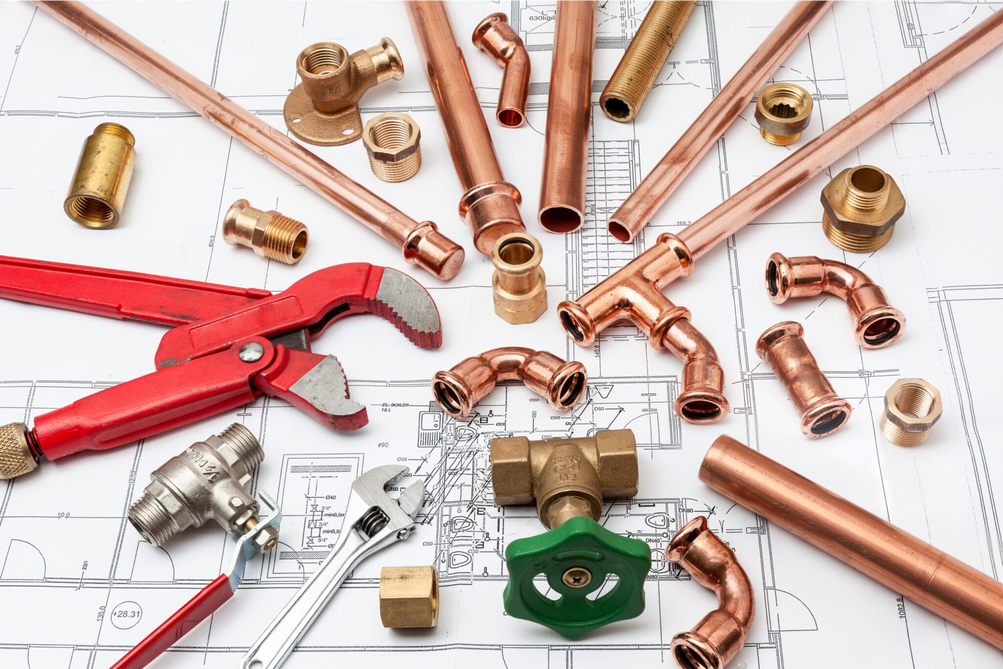 Copper pipes, fittings, valves, and plumbing tools in Brighton